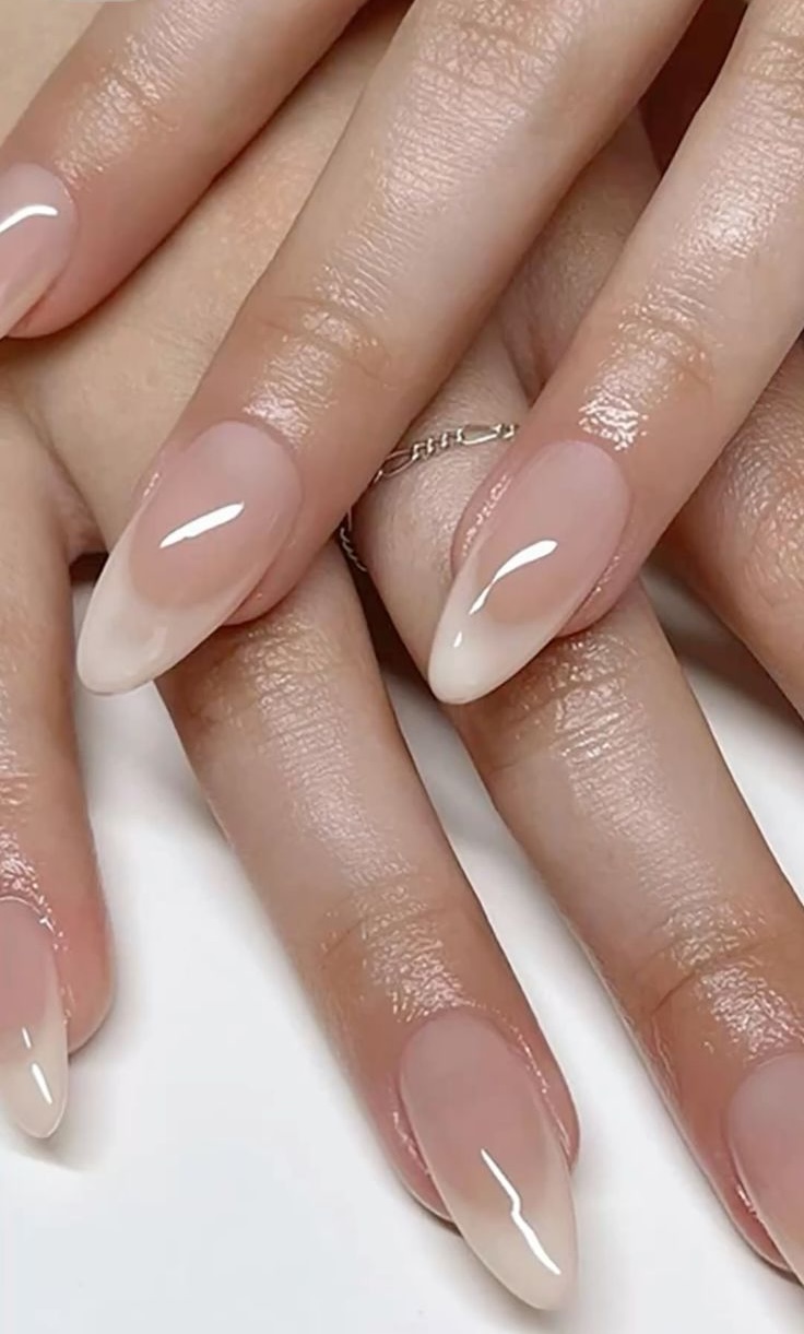 Soft cream French manicure on a natural soft gel overlay.