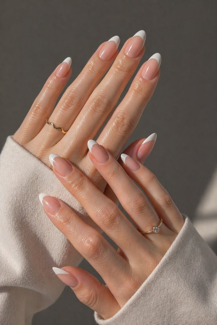 Classic French tip manicure with a crisp white edge.
