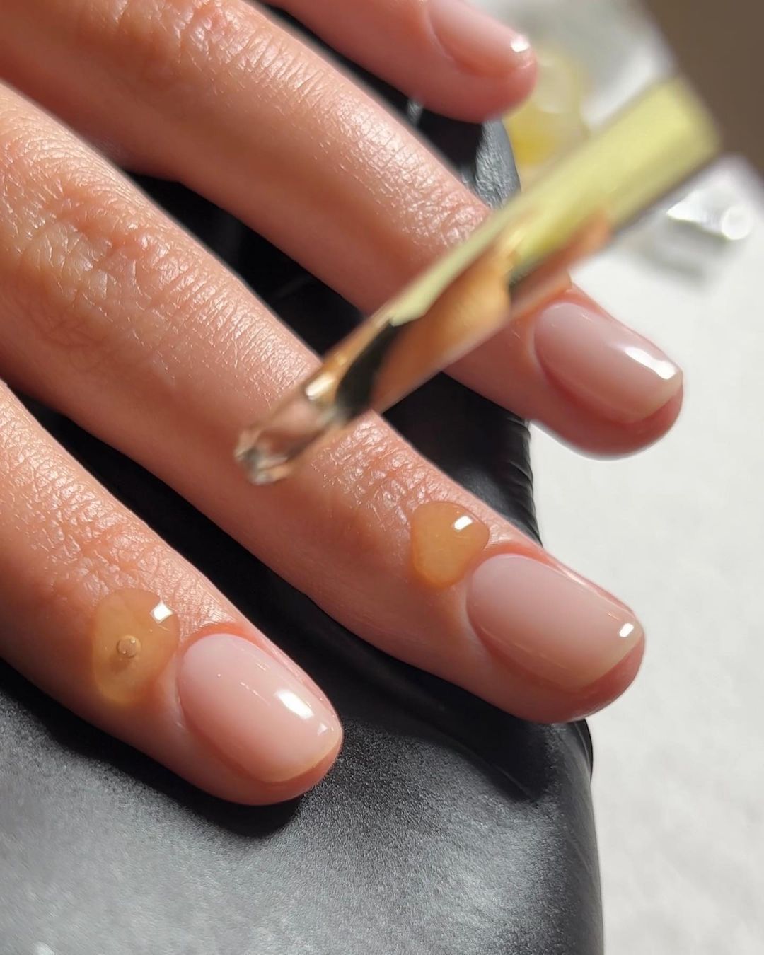 Soft glazed Gel X set in a natural almond shape.