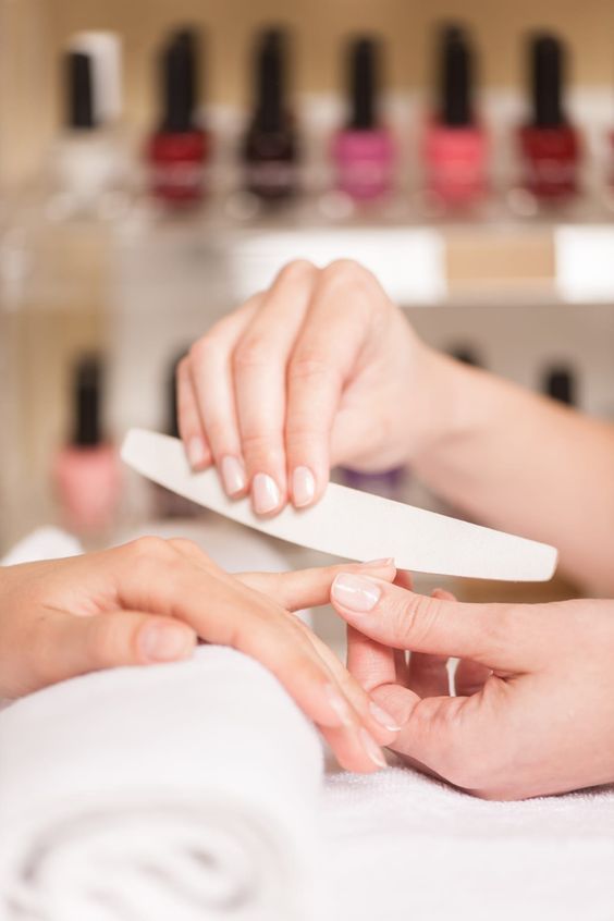 A close-up of a builder gel manicure with refined cuticle work.